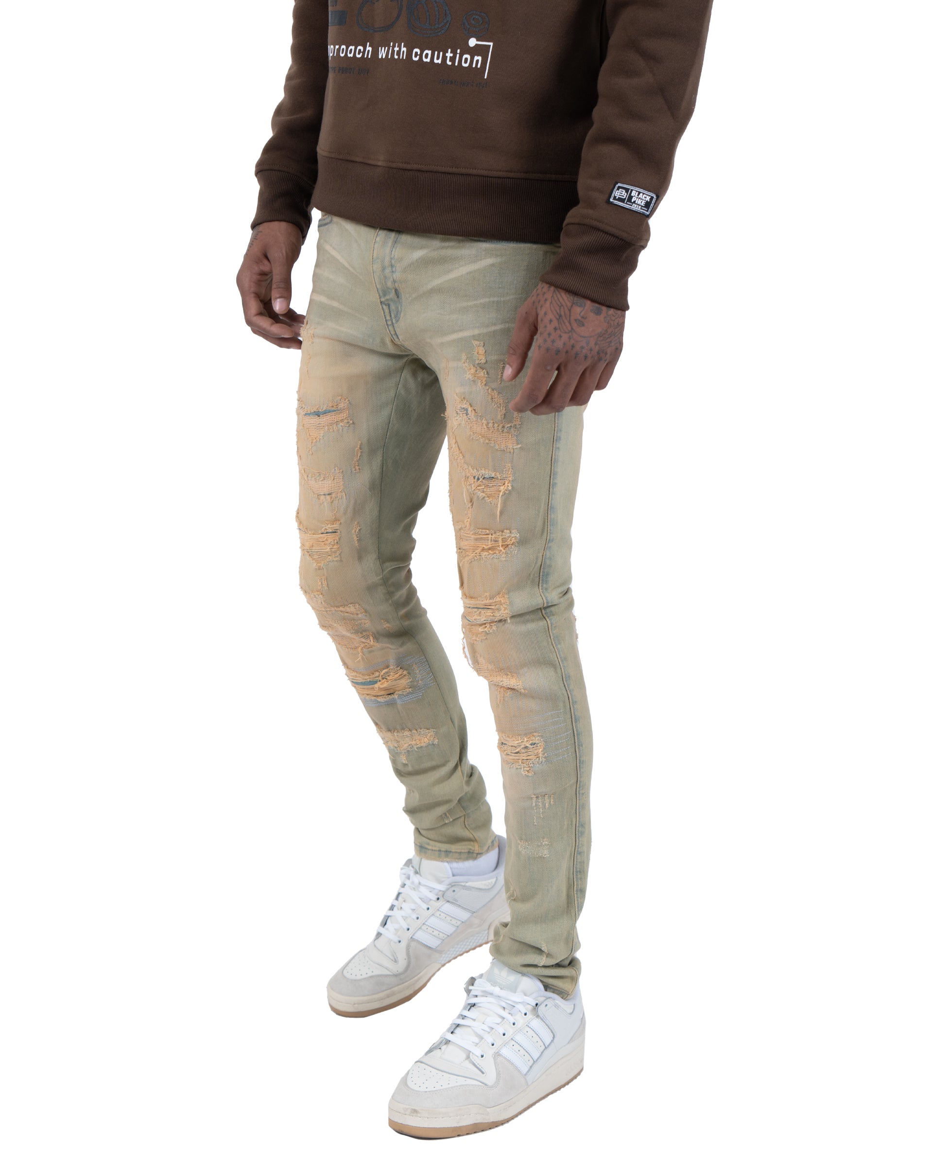 ERIE | Rip & Repair Skinny Jeans in Vintage Green Wash